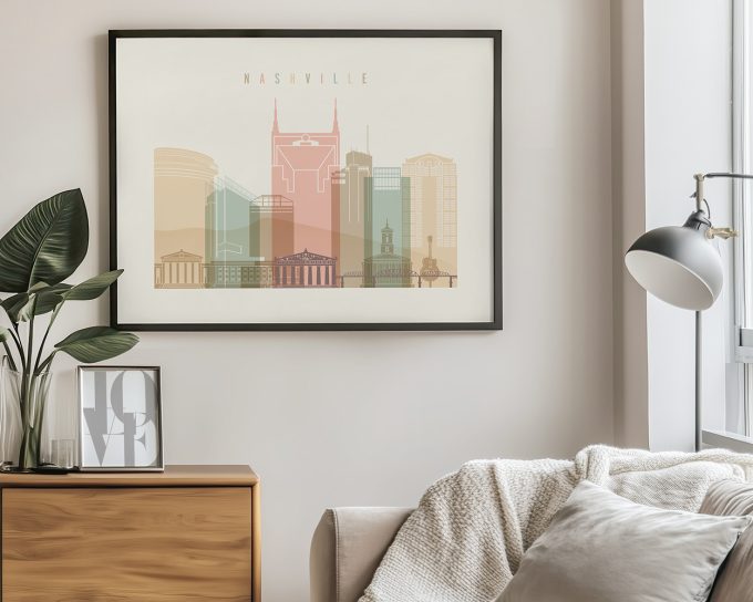 Art print featuring a stylized cityscape of Nashville with various buildings and landmarks.