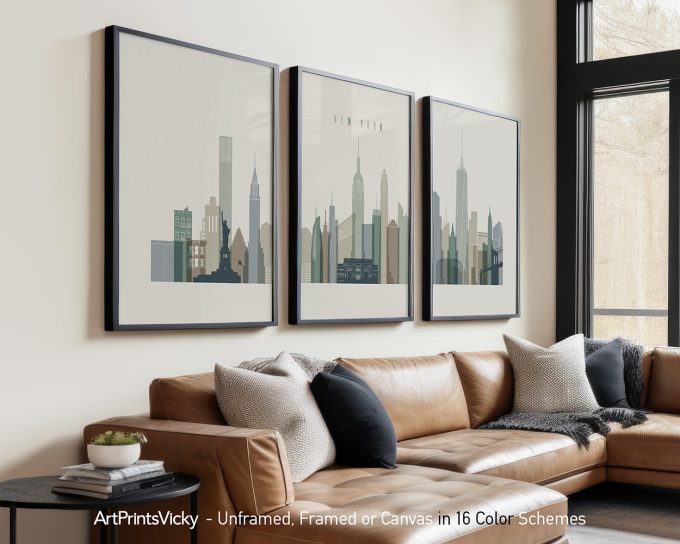 Three framed art prints depicting the New York City skyline in a minimalist style.