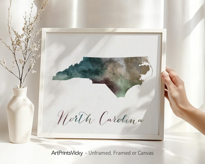 Art print of North Carolina map with watercolor effect in muted colors.