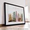 Art print of Reykjavik city skyline featuring various buildings in muted colors.
