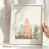 Illustration of Sarajevo's skyline featuring prominent buildings in soft colors.