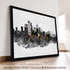 Framed print of Seattle skyline with the Space Needle and mountains in the background.