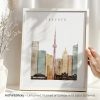 Art print of Toronto skyline featuring iconic buildings and the CN Tower in a minimalist design.