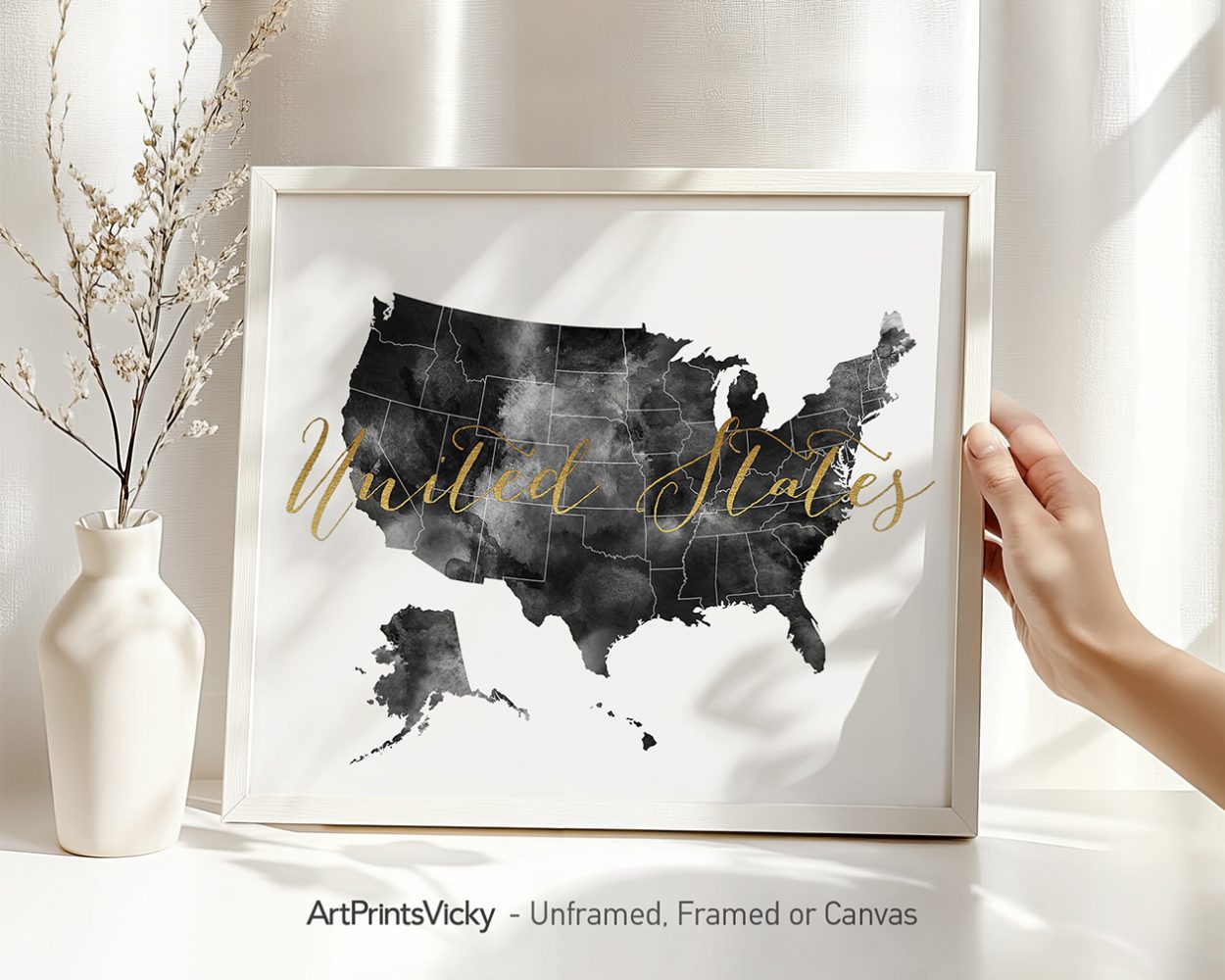Black and white map of the United States with the text 'United States' in gold lettering.