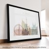 Framed artwork depicting a stylized cityscape of Vienna with notable landmarks.