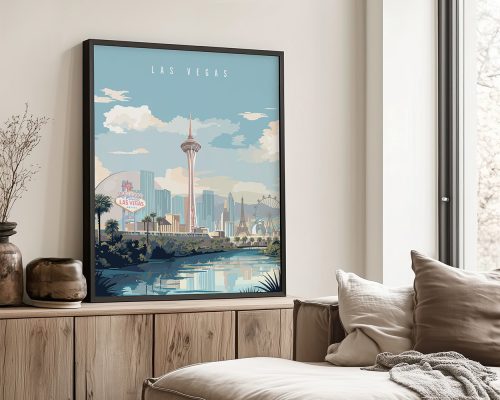 Framed artwork depicting a stylized cityscape of Las Vegas with notable landmarks and a river.