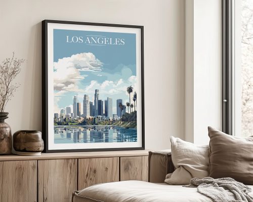 Framed print of a Los Angeles cityscape featuring buildings and palm trees against a blue sky.