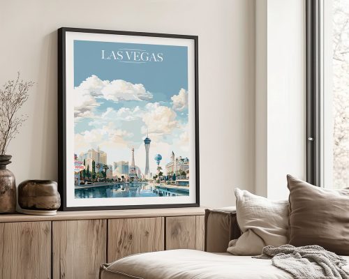 Framed art print of Las Vegas featuring city skyline and clouds in a blue sky.
