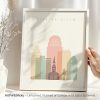 Art print of Winston-Salem cityscape featuring buildings in pastel colors.