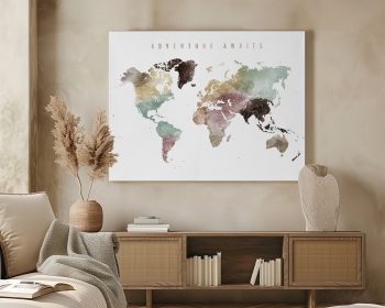 Artistic world map featuring various colors and textures with the phrase 'Adventure Awaits' at the top.