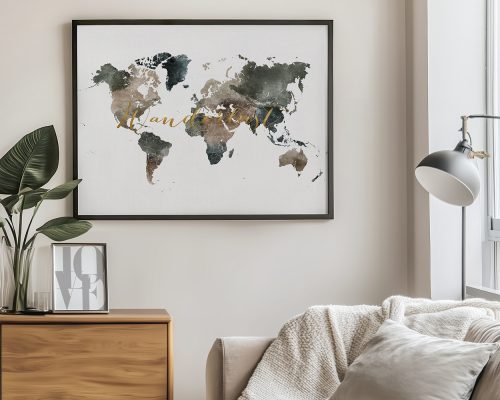 Framed world map artwork featuring muted colors and gold lettering on a light background.